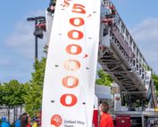 $5 million golad on banner dropped from fire truck ladder
